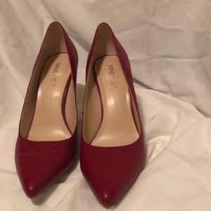Nine West Red Pumps.  4 inch heel size 8. Like new.